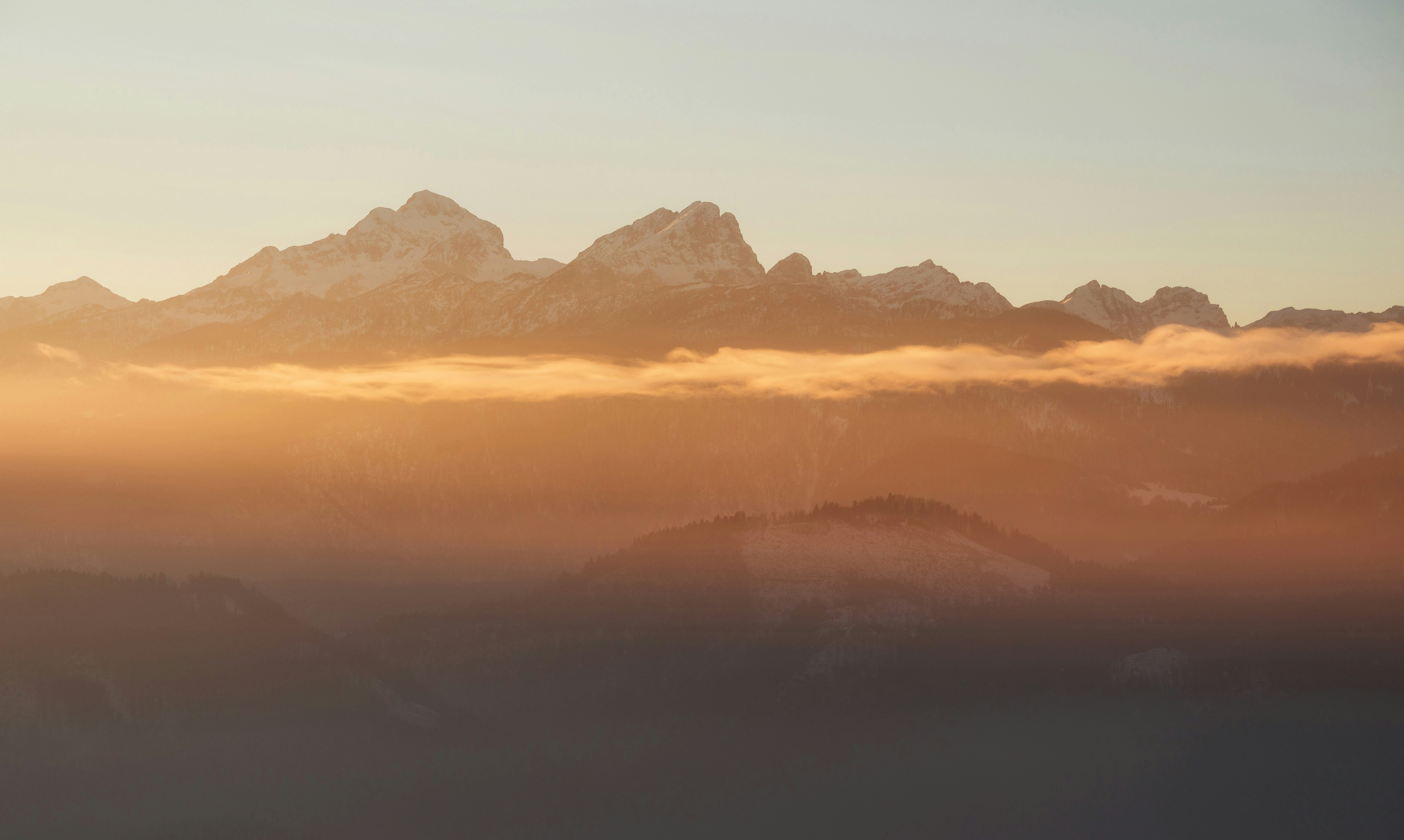 mountain covered by clouds